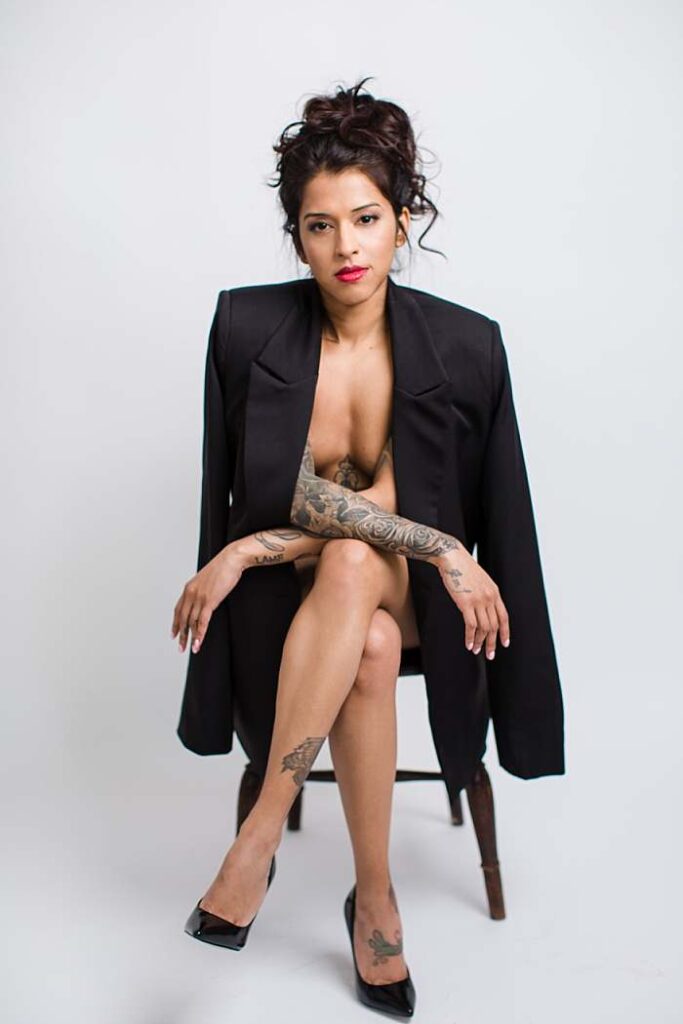 london-boudoir-photographer-asian-woman-implied-nude-covered-in-mans-jacket-on-shoulder