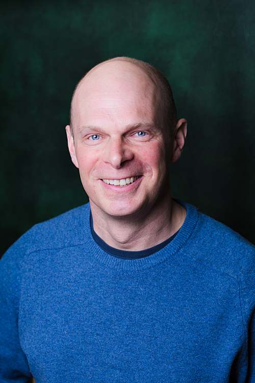 best-linkedin-photos-mechanic-engineer-bald-head-man-relaxed-head-shot-photography-hampstead