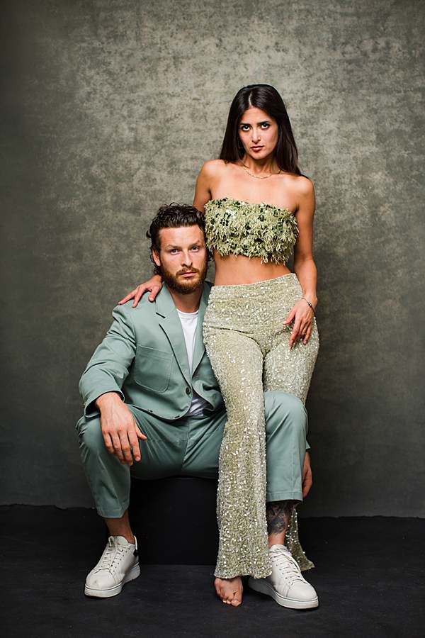 magazine-style-couple-photoshoot-with-woman-standing-up-man-holding-woman-on-waist