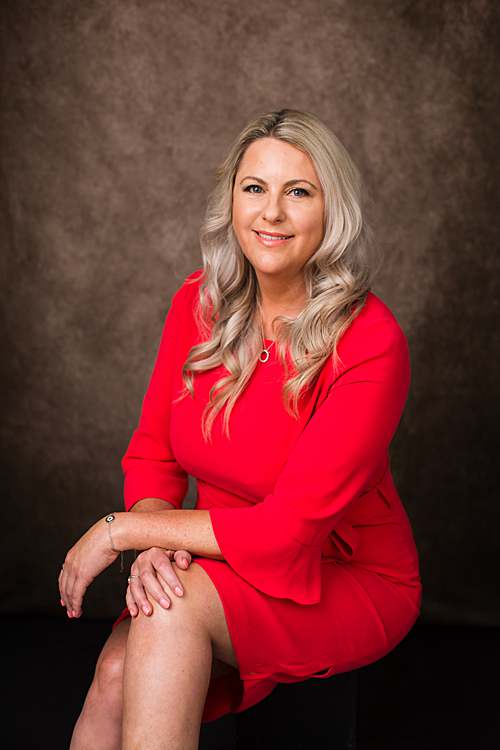 blonde-hair-woman-in-orange-dress-business-portrait-by-london-professional-photographer